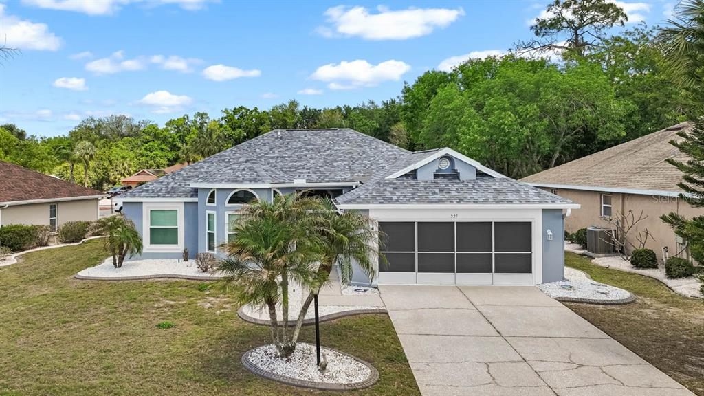 327 CALOOSA WOODS LANE