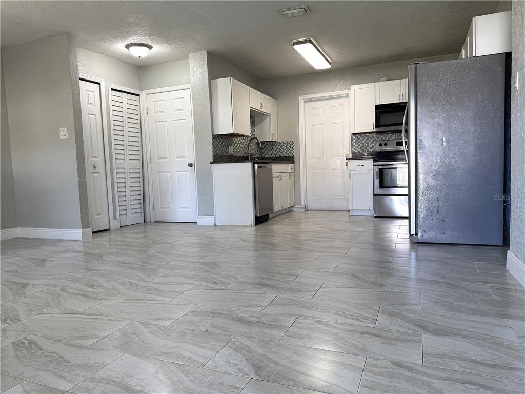 7719 UDINE AVENUE, ORLANDO, FL — photo 4 of 20