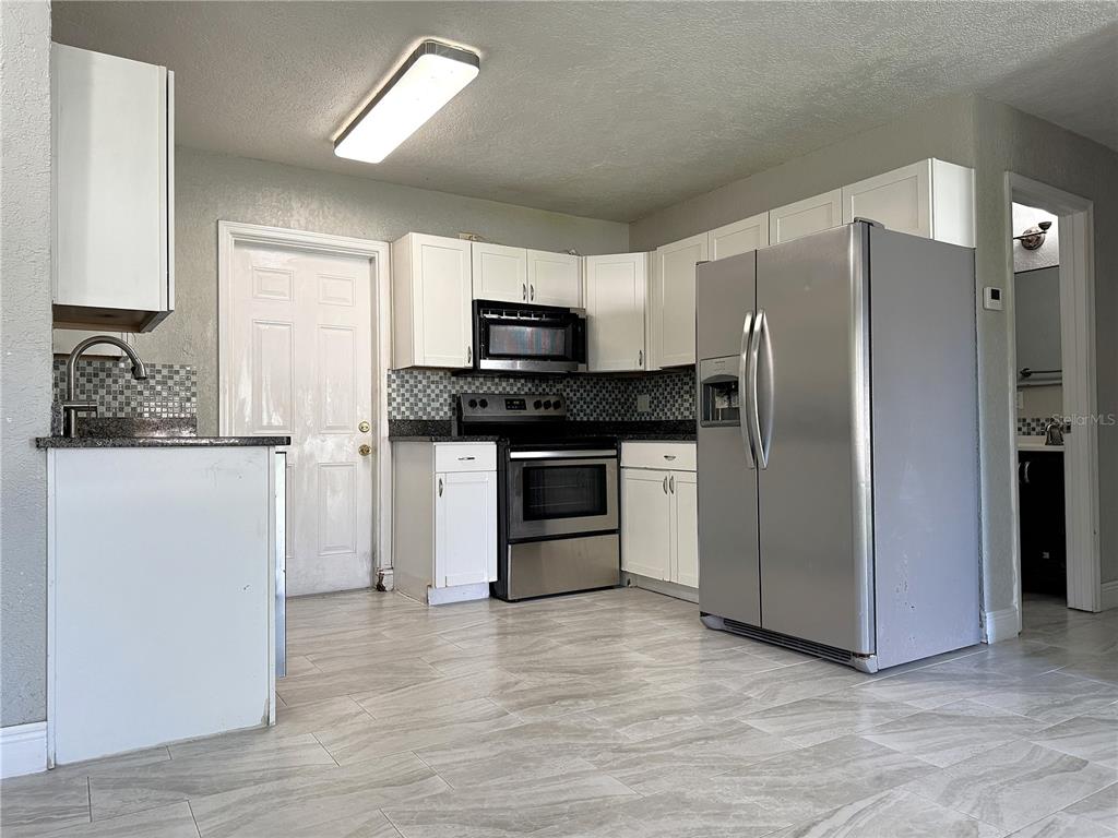 7719 UDINE AVENUE, ORLANDO, FL — photo 5 of 20