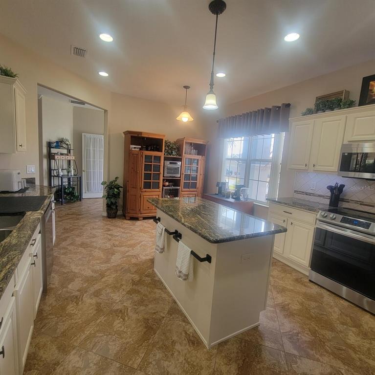 9302 SE 120TH LOOP, SUMMERFIELD, FL — photo 5 of 24