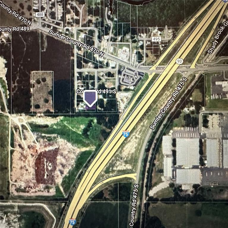 This is an aerial map showing a property location highlighted in purple near Interstate 75 — LOT #5, LAKE PANASOFFKEE, FL