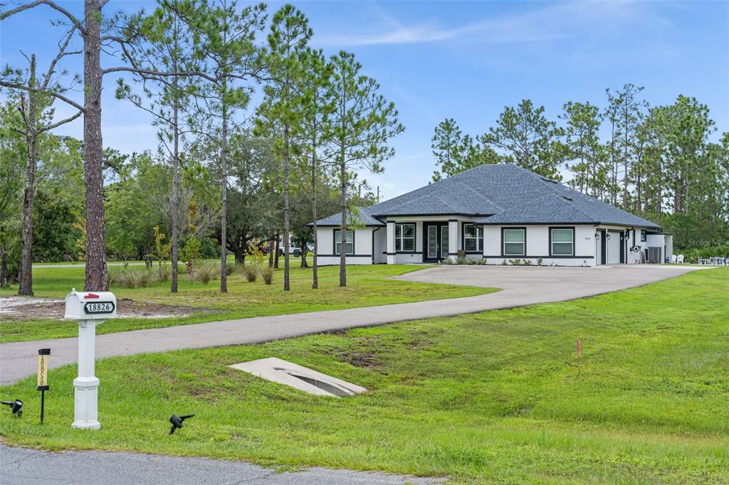 18826 REYNOLDS PARKWAY, ORLANDO, FL — photo 2 of 30
