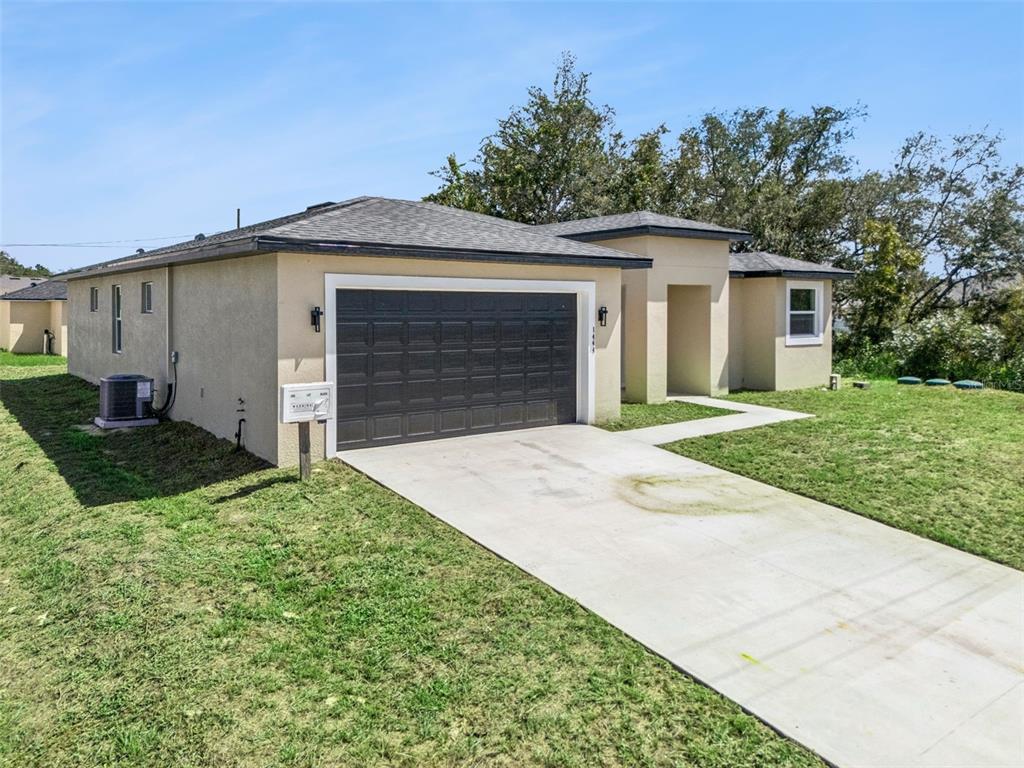 1444 SARASOTA DRIVE, POINCIANA, FL — photo 2 of 28