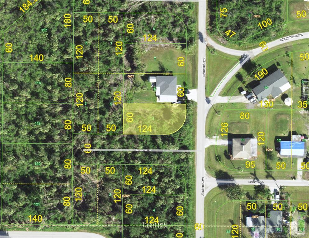 This is a property map showing residential lots, roads, and existing houses — 141 GLENHOLM AVENUE, PUNTA GORDA, FL