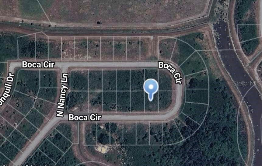 This is a satellite map view of a vacant residential lot on a circular street — 352 BOCA CIRCLE, LABELLE, FL
