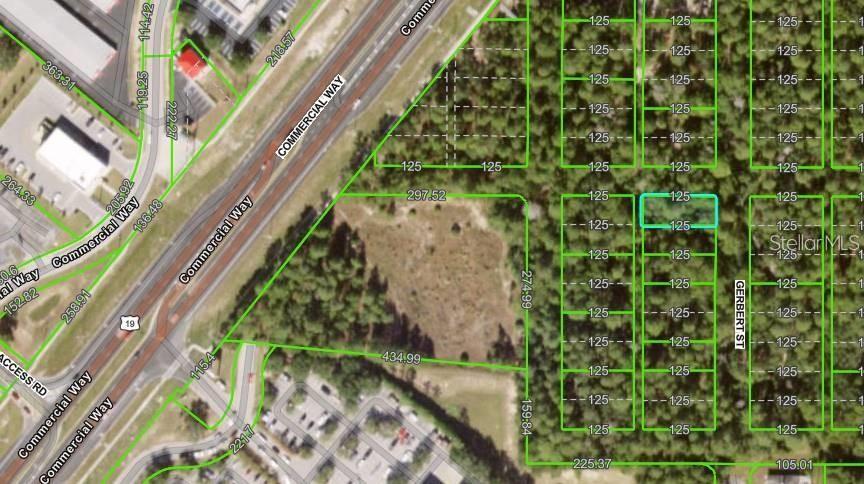 This is an aerial map showing a vacant lot highlighted in blue near a highway — Lot 1 GERBERT STREET, SPRING HILL, FL