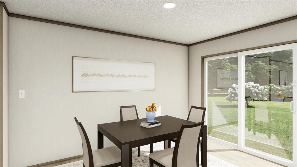 This digital rendering shows a dining area with a dark table, chairs, and sliding glass doors — 40390 COUNTRY ROAD, EUSTIS, FL