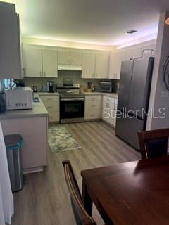 9116 SE 135TH LANE, SUMMERFIELD, FL — photo 5 of 17