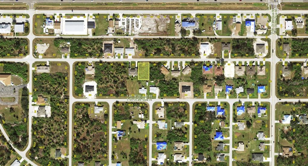 This is an aerial map view showing a vacant rectangular lot highlighted in yellow — 10435 PENDLETON AVENUE, ENGLEWOOD, FL