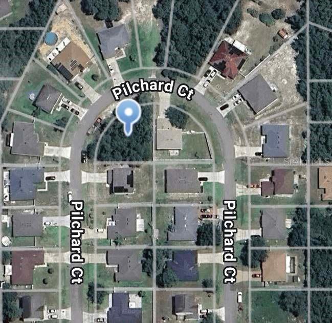 This is an aerial map view of a residential cul-de-sac with several houses — 1626 PILCHARD COURT, POINCIANA, FL