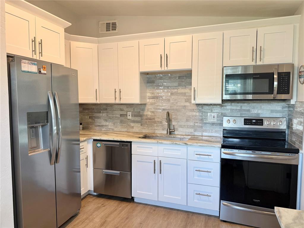 5144 13TH AVENUE S, GULFPORT, FL — photo 3 of 28
