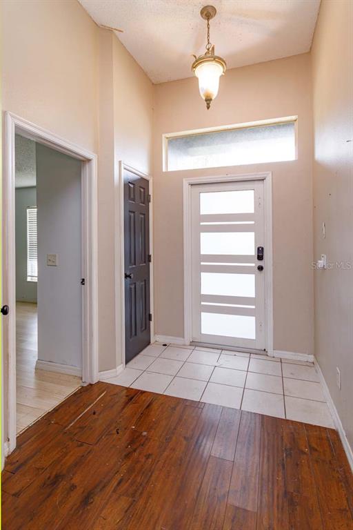 3905 WHISPERING PINE COURT, MASCOTTE, FL — photo 3 of 30