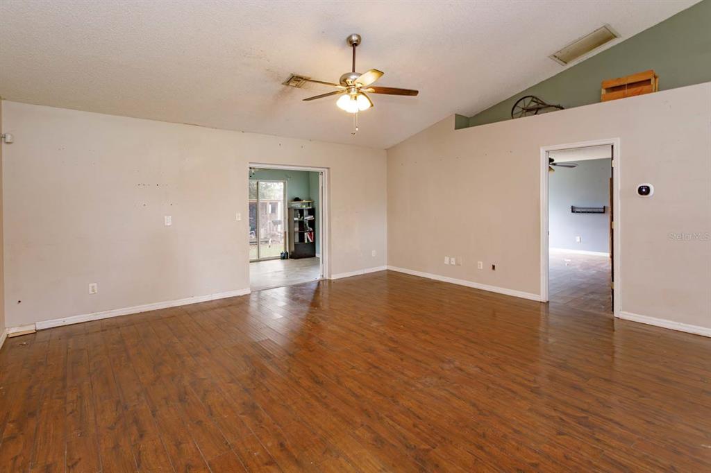 3905 WHISPERING PINE COURT, MASCOTTE, FL — photo 4 of 30