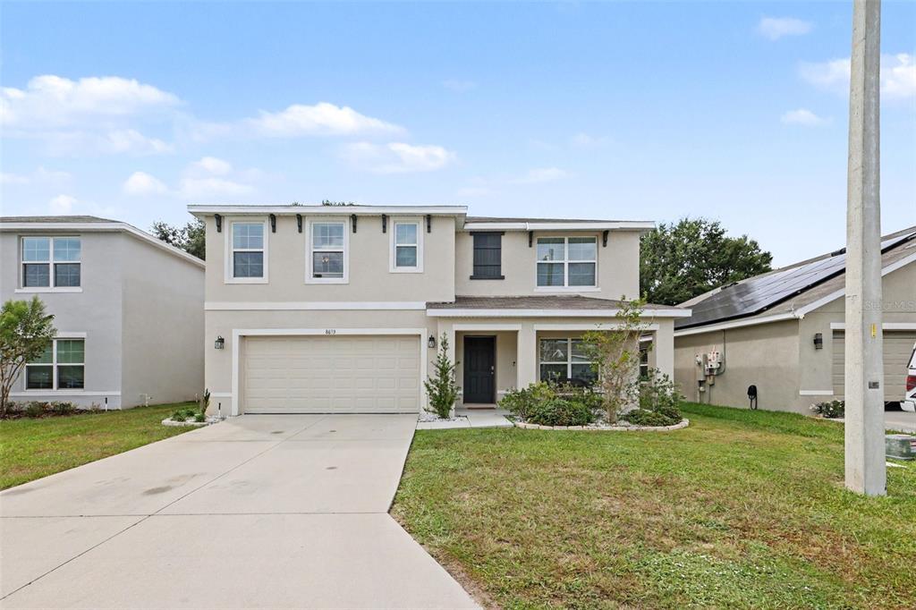 8693 TRIUMPH CIRCLE, WILDWOOD, FL — photo 2 of 30