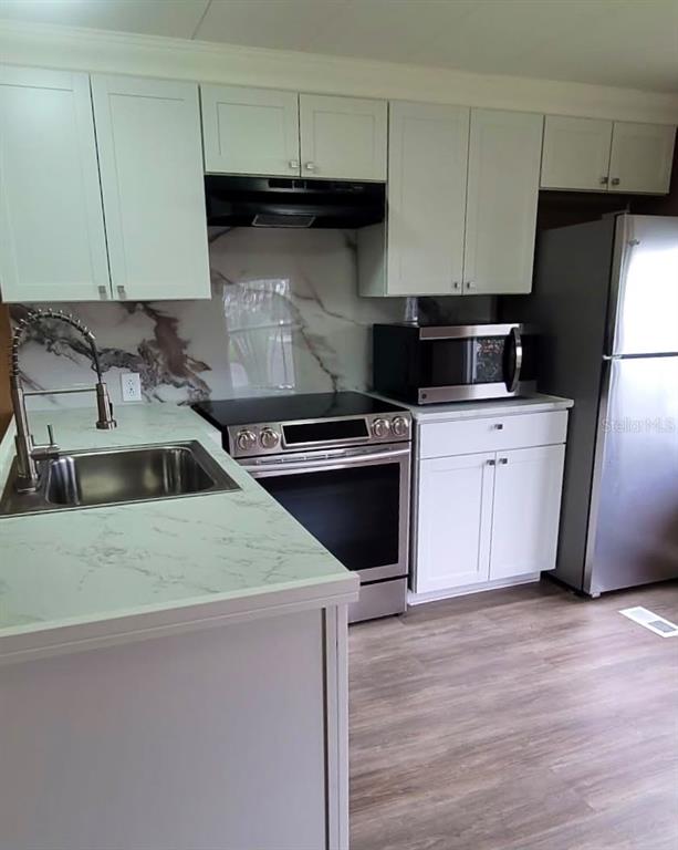 5316 53RD AVENUE E UNIT E3, BRADENTON, FL — photo 4 of 24