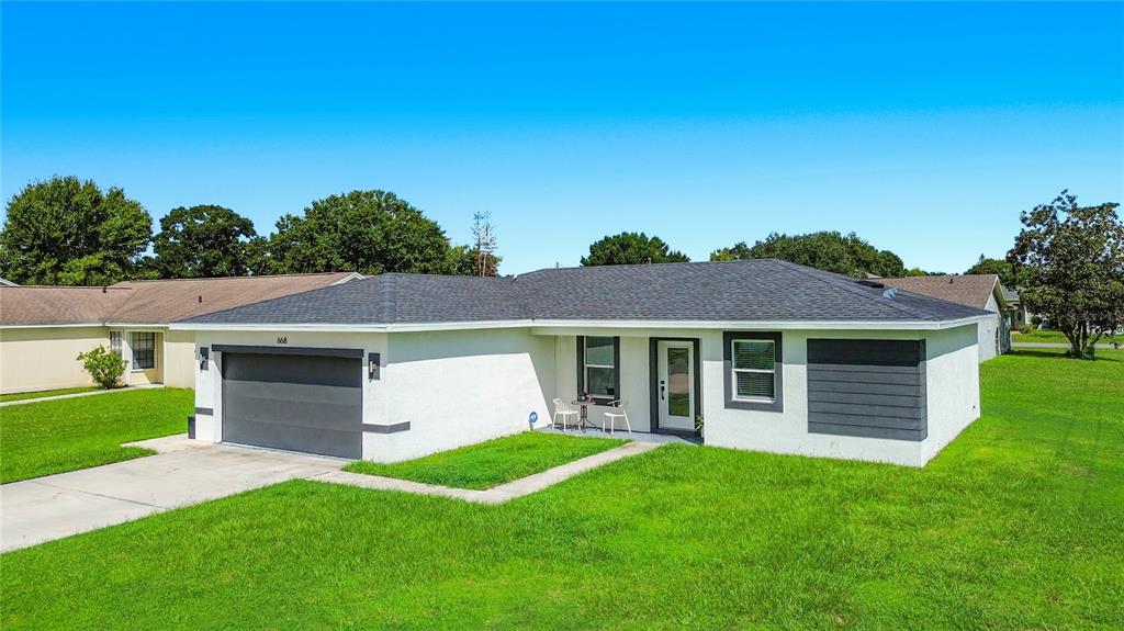 668 DROMEDARY COURT, POINCIANA, FL — photo 2 of 30