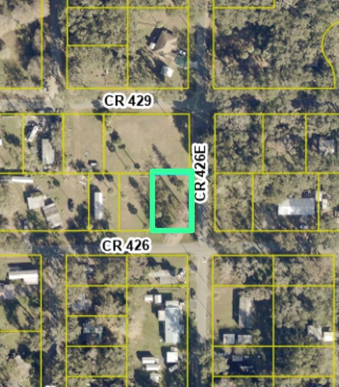 This is an aerial map showing a highlighted vacant lot near a road intersection — TBD CR 426, LAKE PANASOFFKEE, FL