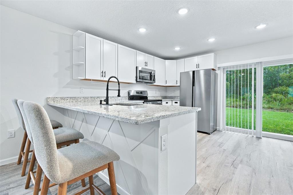 12151 SORA AVENUE, WEEKI WACHEE, FL — photo 4 of 30