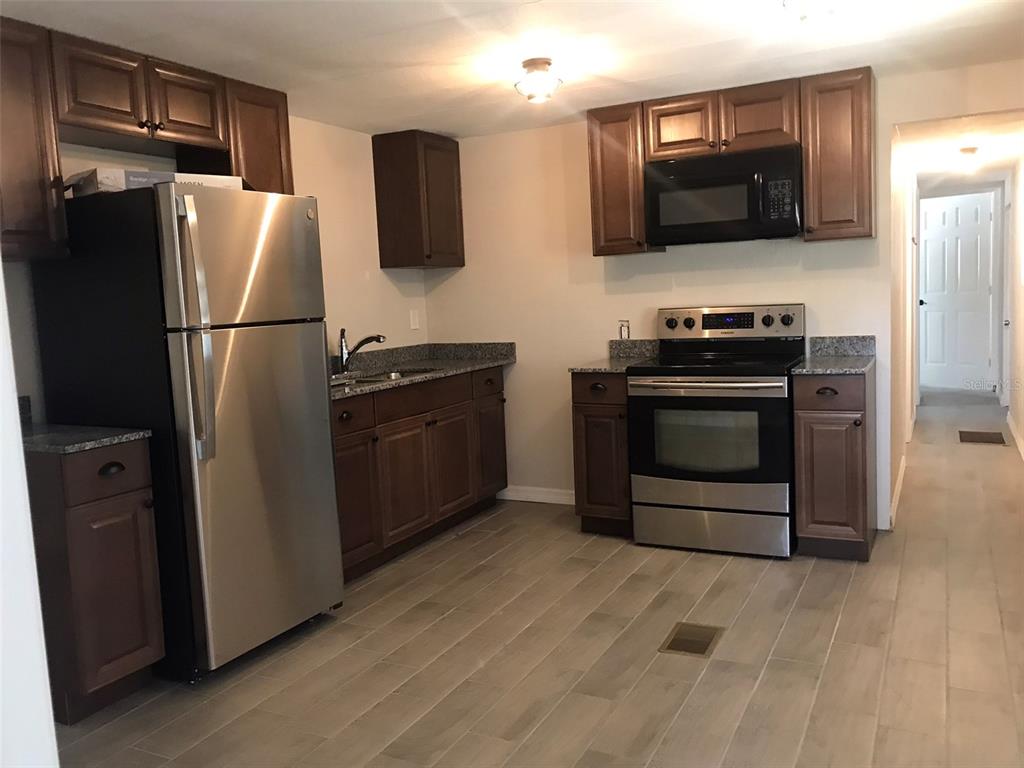 7037 LOFTY DRIVE, PORT RICHEY, FL — photo 2 of 5