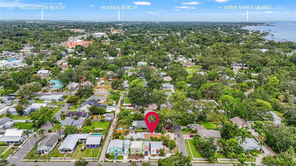 An aerial view shows a residential neighborhood with a red location pin over a house — 2705 2ND AVENUE W, BRADENTON, FL