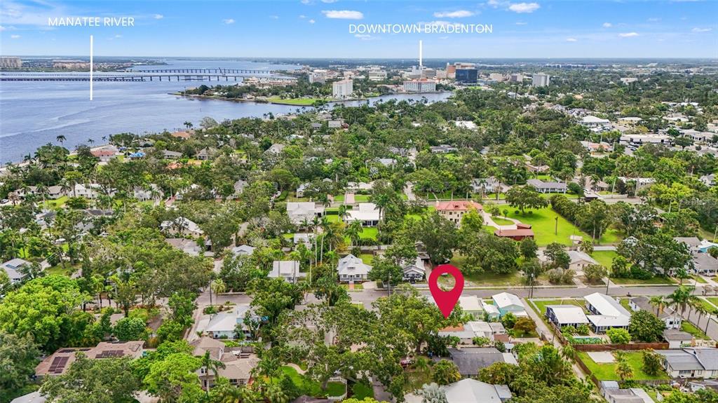 An aerial view shows a residential neighborhood with a red pin marking a specific property — 2705 2ND AVENUE W, BRADENTON, FL