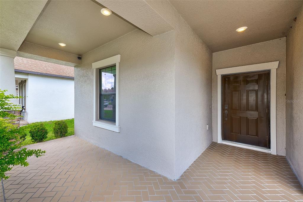 8121 SEQUESTER LOOP, LAND O LAKES, FL — photo 2 of 34