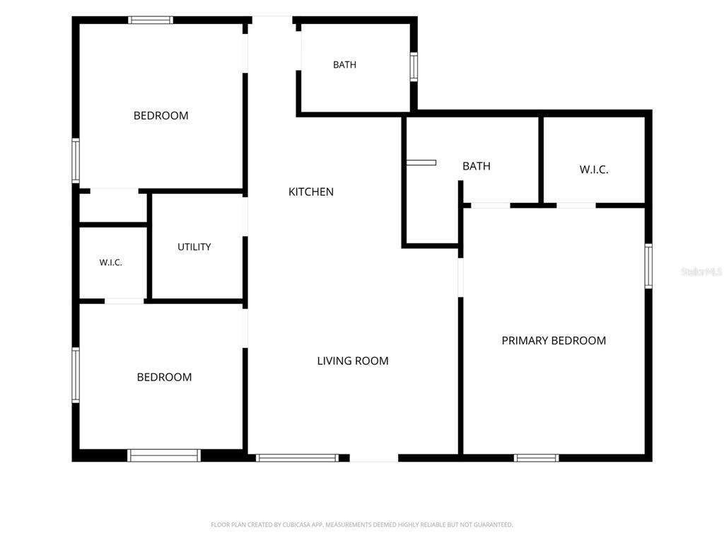 This is a floor plan showing a three-bedroom, two-bathroom home with a central living area — 7851 40TH AVE N, ST PETERSBURG, FL