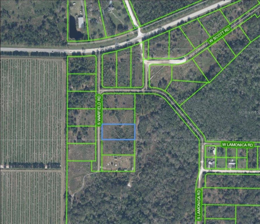 This is an aerial map showing a rectangular parcel of land highlighted in blue — 731 S WARFIELD ROAD, AVON PARK, FL