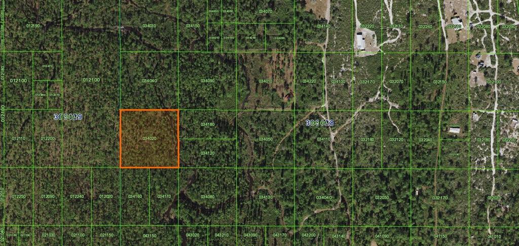 This is an aerial map showing a highlighted rectangular land parcel among surrounding wooded lots — RIVER RANCH, FROSTPROOF, FL