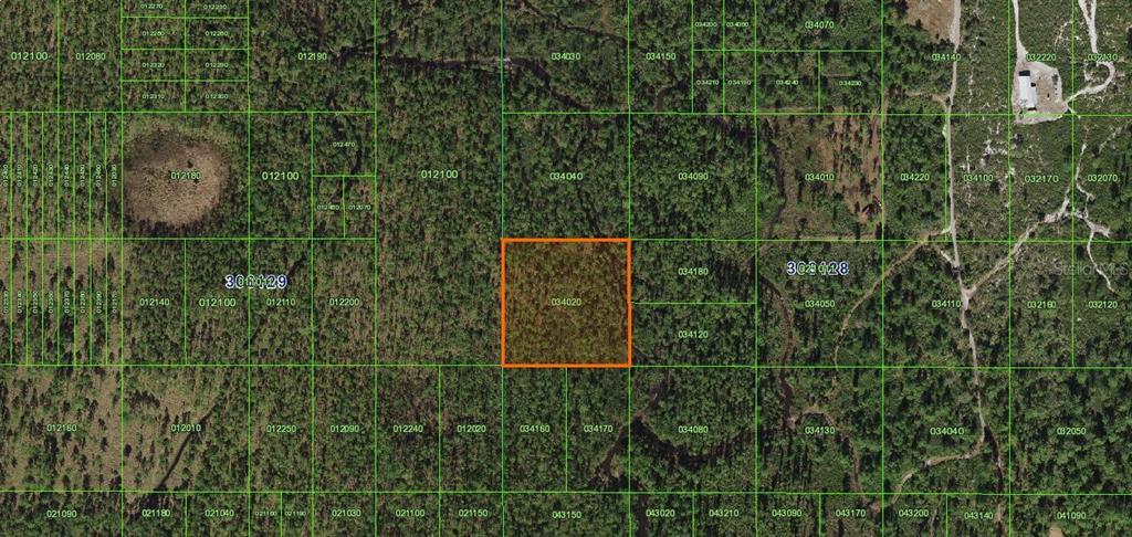 This is an aerial map showing a highlighted rectangular parcel of land among surrounding lots — RIVER RANCH, FROSTPROOF, FL