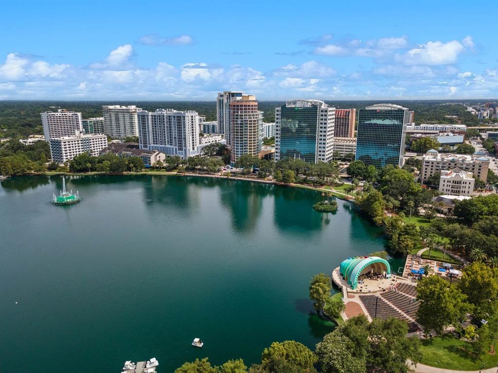 An aerial view of Lake Eola Park in downtown Orlando with surrounding high-rise buildings — 1008 E RIDGEWOOD ST, ORLANDO, FL