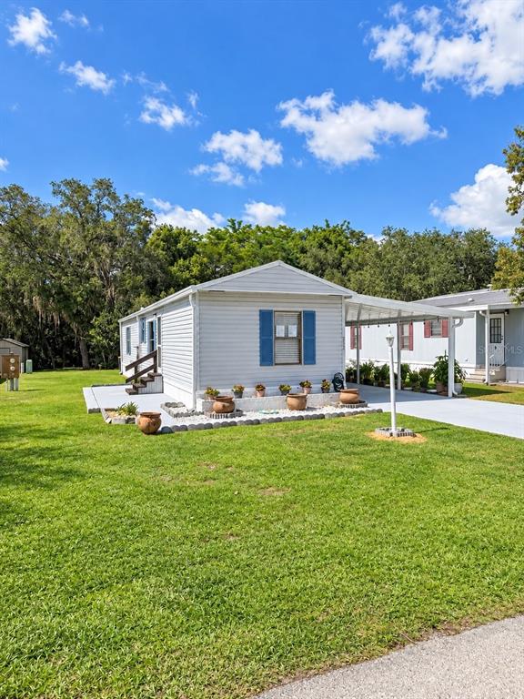 232 S CAMPHOR LOOP, AVON PARK, FL — photo 2 of 30