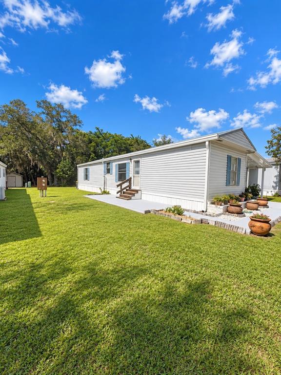 232 S CAMPHOR LOOP, AVON PARK, FL — photo 3 of 30