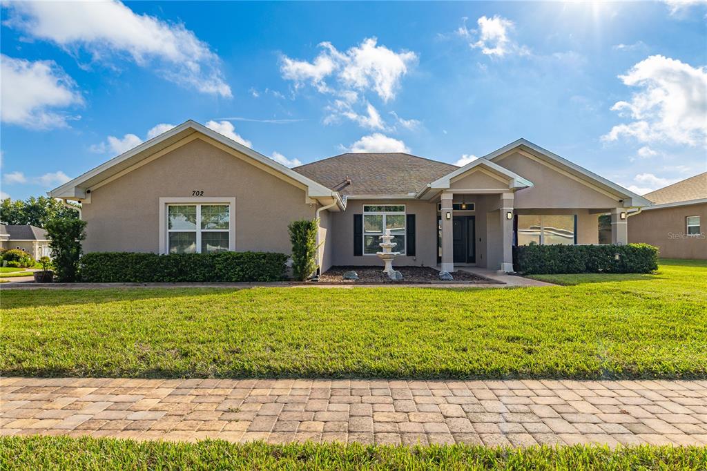 702 COUNTRY WALK COVE, EAGLE LAKE, FL — photo 2 of 50
