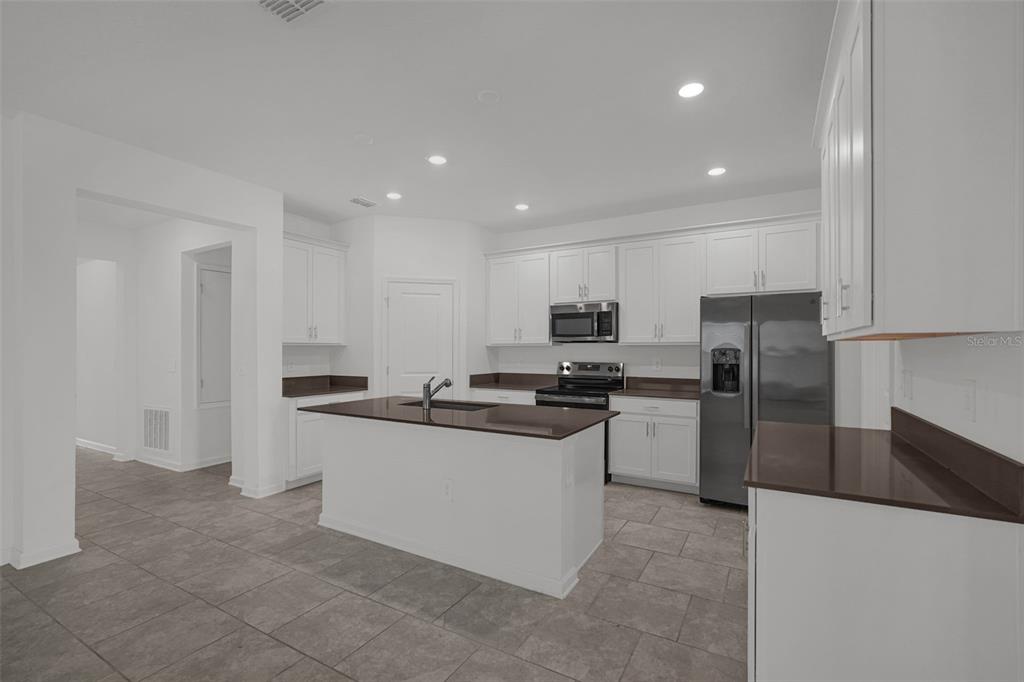 8967 CHIPPING SQUARE LANE, DAVENPORT, FL — photo 4 of 34