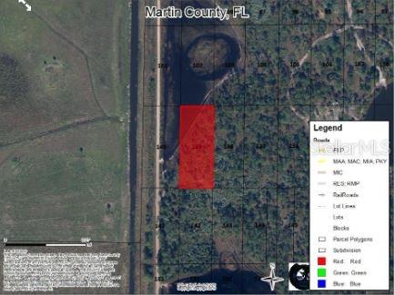 This map shows a rectangular red parcel of land highlighted within a grid of lots — N/A, INDIANTOWN, FL