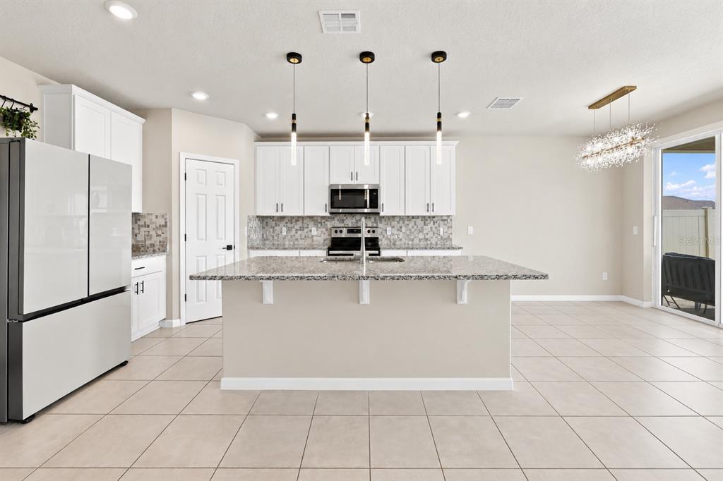 1282 CITRUS LANDINGS BOULEVARD, DAVENPORT, FL — photo 5 of 28