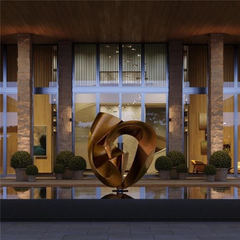 This architectural rendering shows a modern building entrance featuring a large bronze sculpture and reflecting pool — 1000 BENJAMIN FRANKLIN DRIVE UNIT 1108, SARASOTA, FL