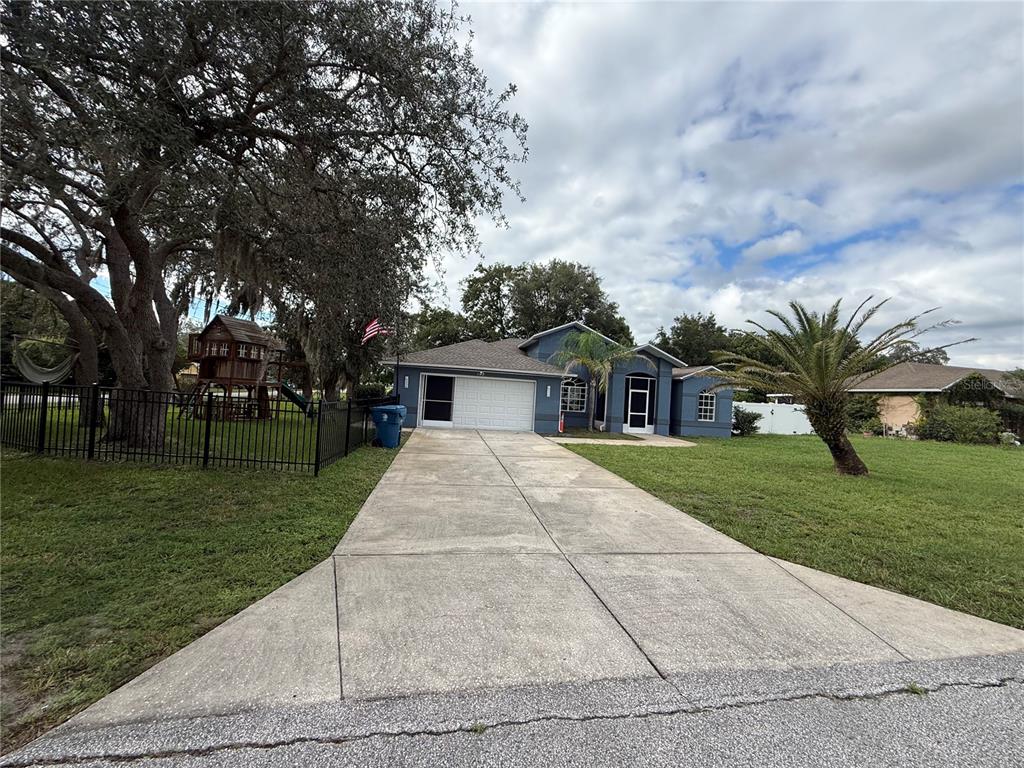173 PORTLAND AVENUE, SPRING HILL, FL — photo 2 of 23