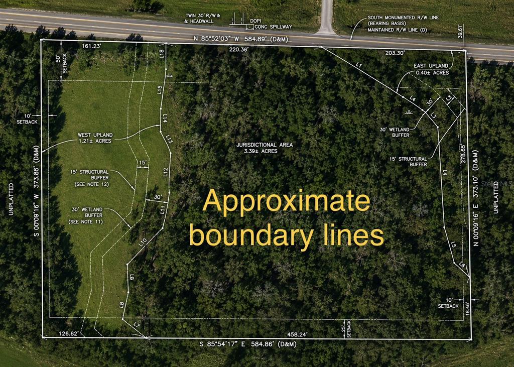 This is a survey map showing property boundary lines, wetland buffers, and upland acreage — 12275 COUNTY ROAD 675, PARRISH, FL