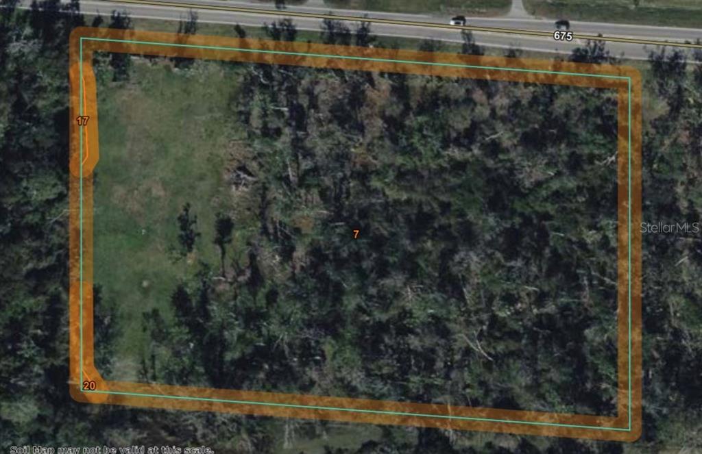 This is a soil map overlaying an aerial view of a wooded, rectangular plot of land — 12275 COUNTY ROAD 675, PARRISH, FL