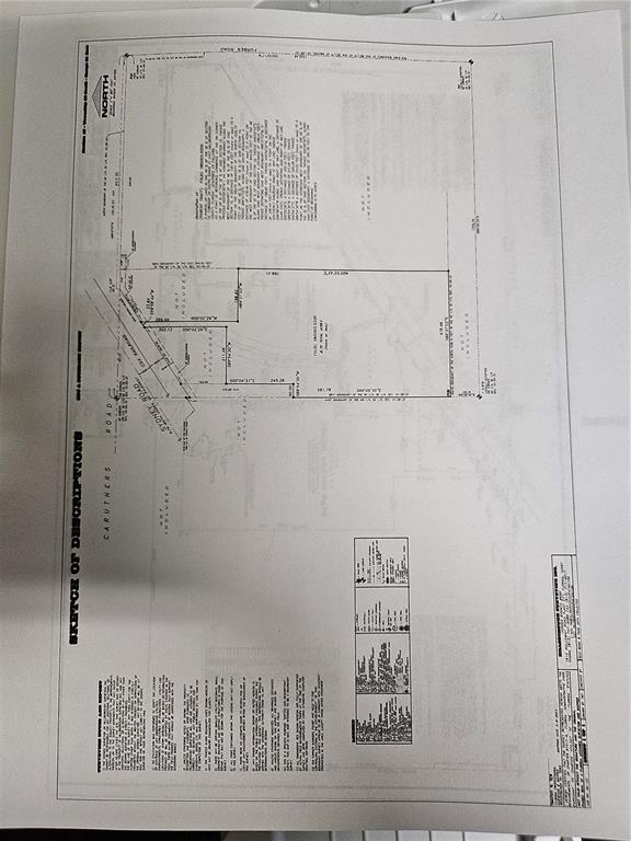 This is a survey map showing property boundaries, road locations, and legal descriptions of a land parcel — SYDNEY ROAD, DOVER, FL