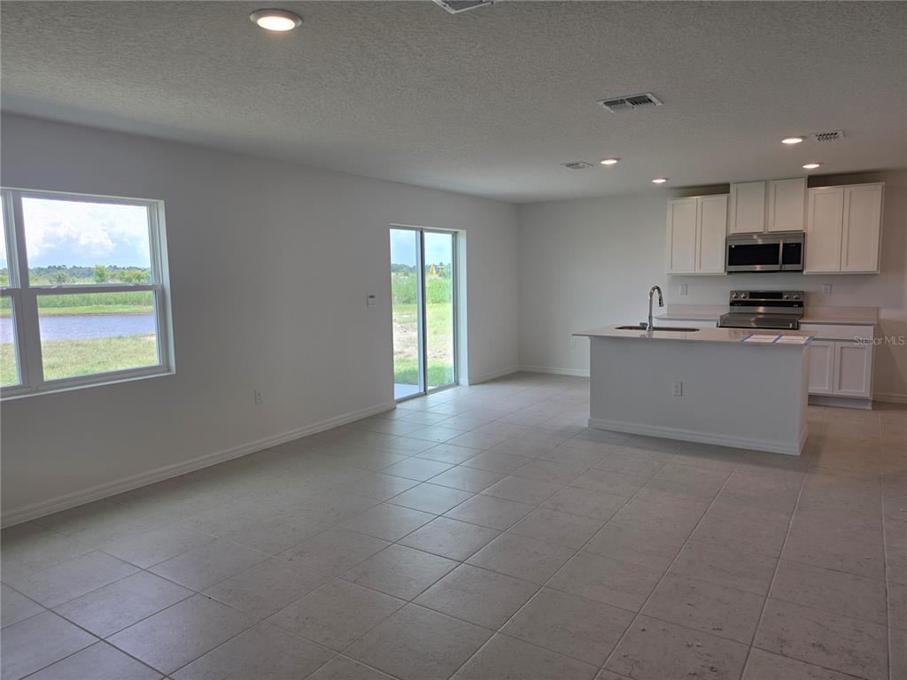 3889 BLUETHREAD WAY, POINCIANA, FL — photo 4 of 22
