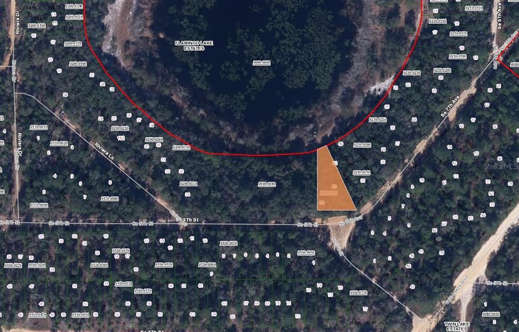 This is a property map showing a highlighted parcel of land near a lake — 00 7TH AVENUE, INTERLACHEN, FL