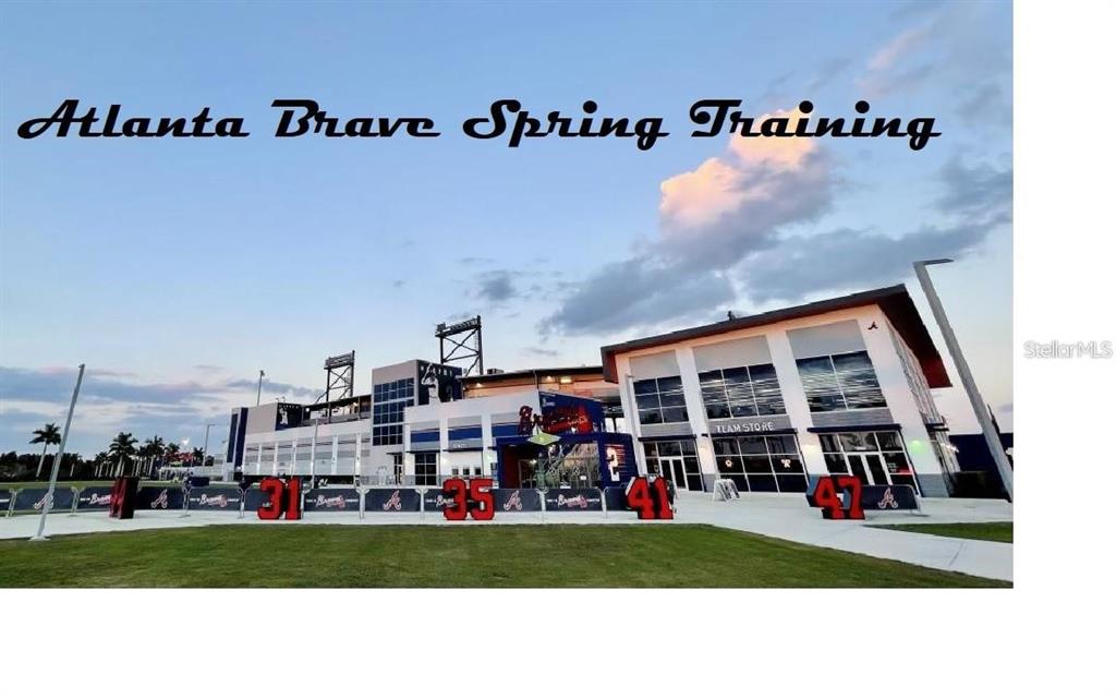 An exterior view of the Atlanta Braves spring training stadium featuring large numbered displays — Lot #12 STOCKTON AVENUE, NORTH PORT, FL