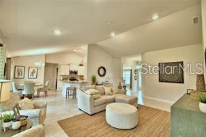 This is a digital rendering of a single-story suburban house with a two-car garage — 37041 HIDDEN VIEW CIRCLE, DADE CITY, FL