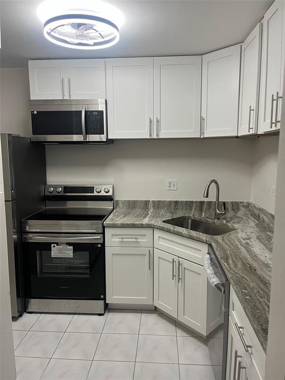 1308 PINE RIDGE CIRCLE E UNIT G3, TARPON SPRINGS, FL — photo 3 of 5