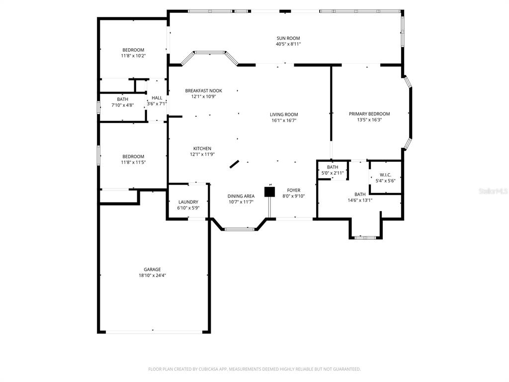 This is a floor plan showing a single-story house with three bedrooms and a sunroom — 12125 KNOTTY PINE LOOP, SAN ANTONIO, FL