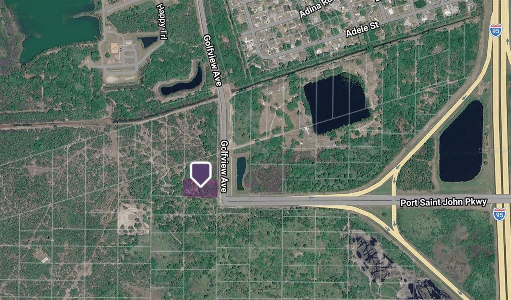 This is an aerial map showing a highlighted land parcel near a highway intersection — GOLFVIEW AVE, COCOA, FL