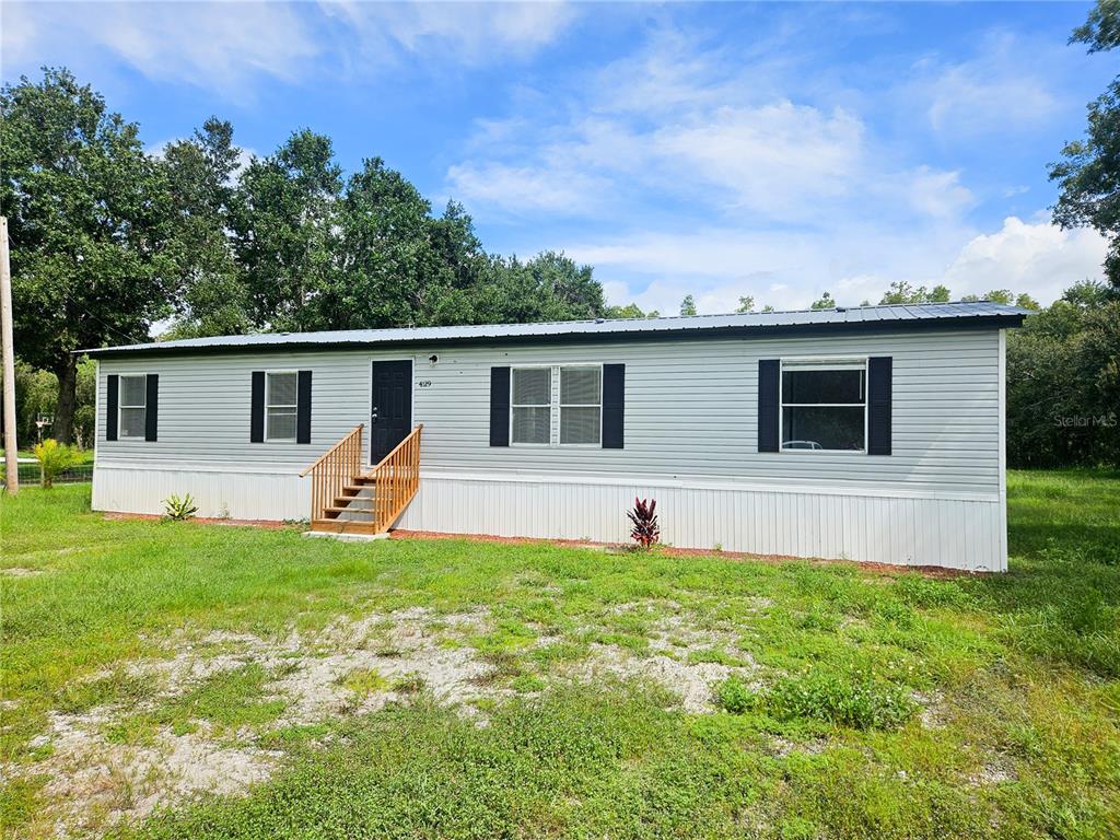 4129 WOODSRIDGE DRIVE, POLK CITY, FL — photo 3 of 35